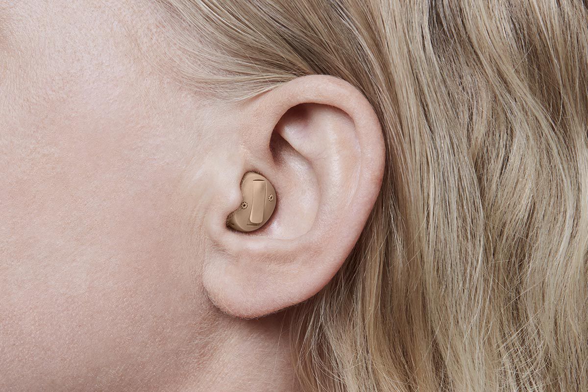 ITC (In the Canal / In the Ear) Hearing Aid on a woman