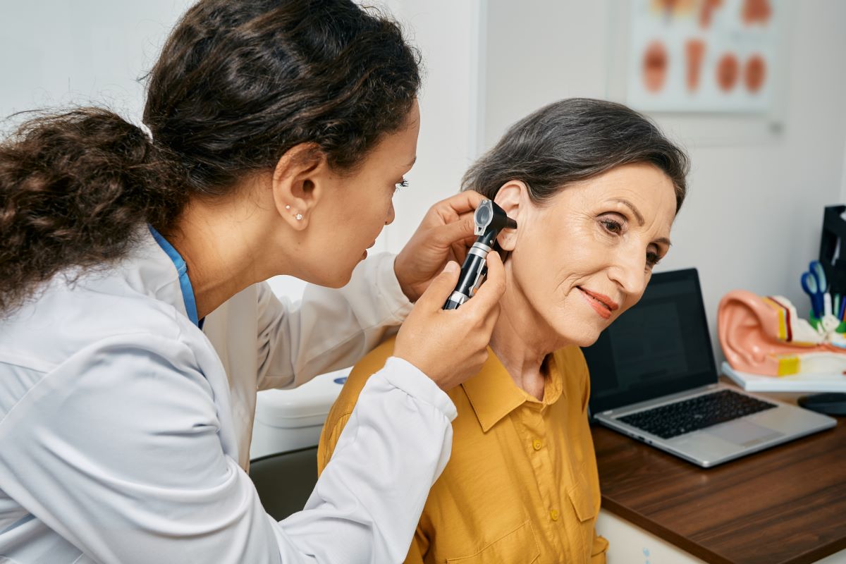 woman having her hearing tested