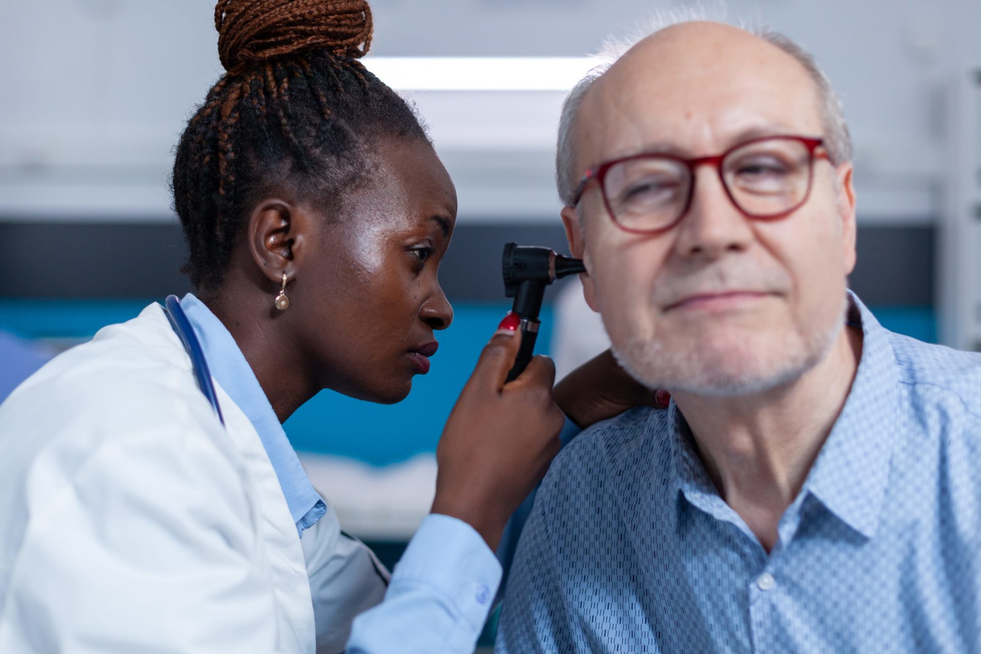 elderly man undergoing a hearing test