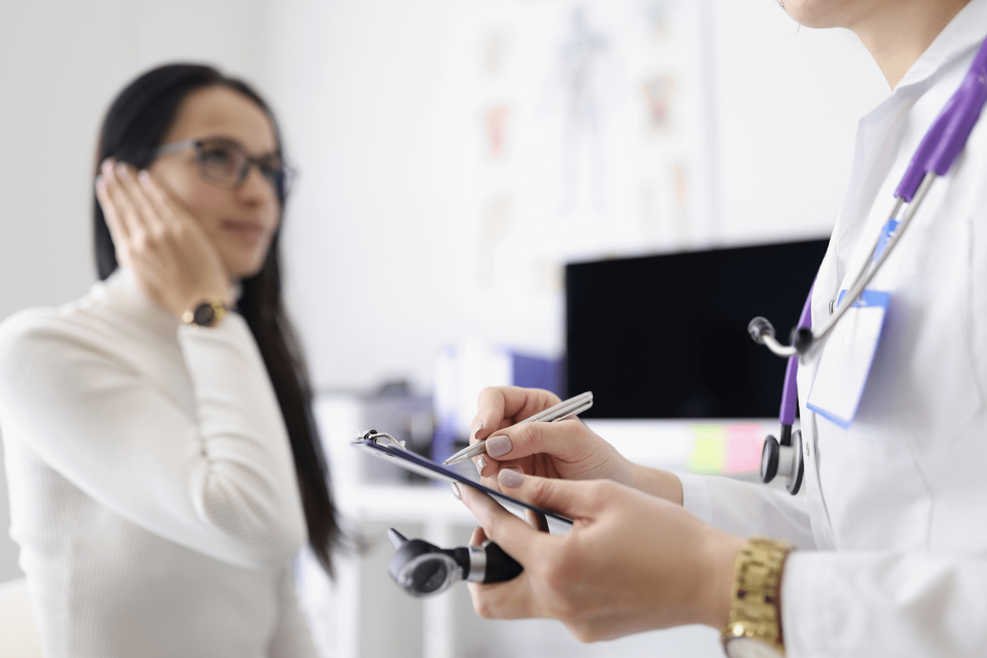 Woman speaking to the audiologist about their hearing tests results