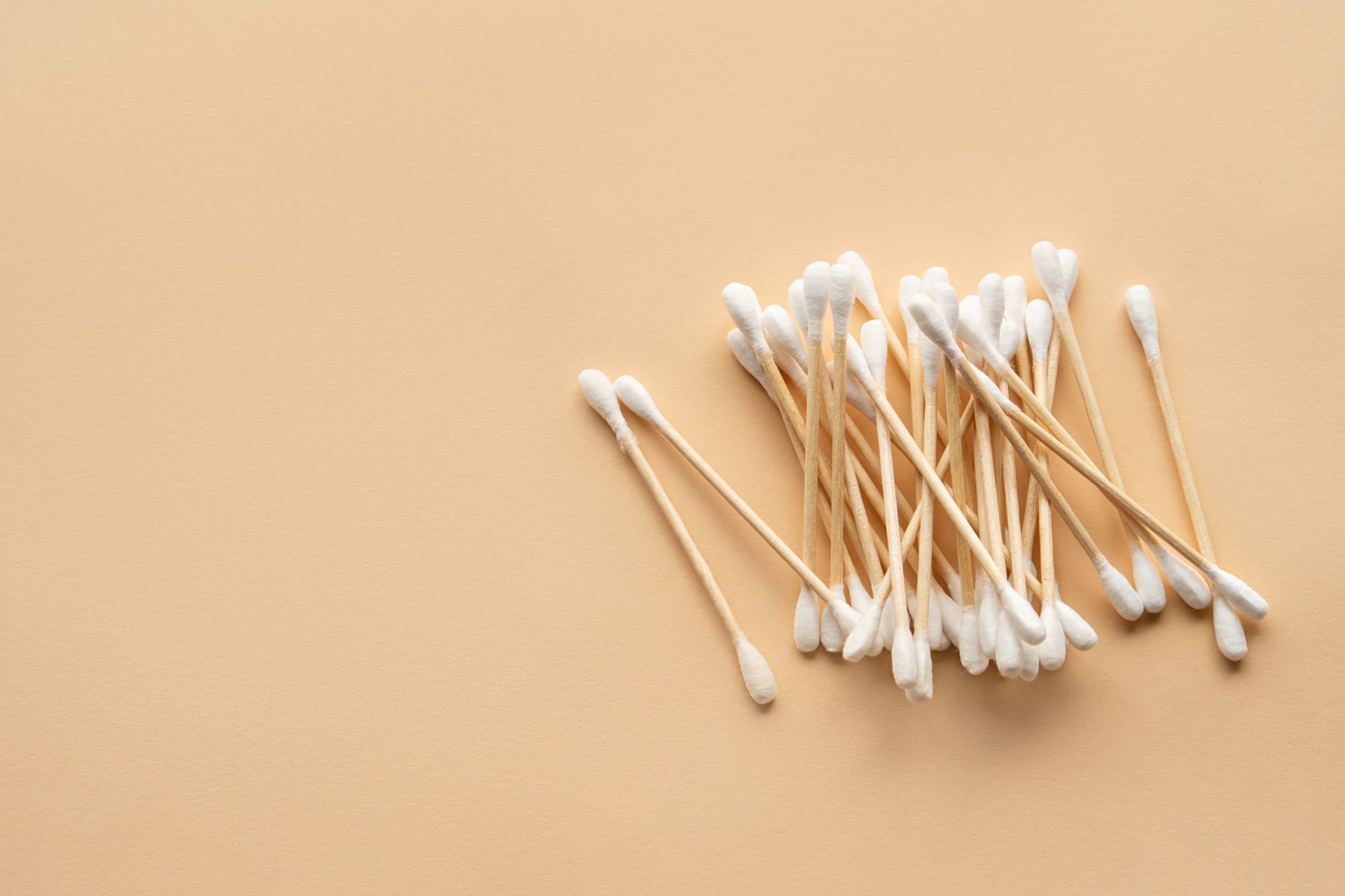 cotton ear buds in a pile